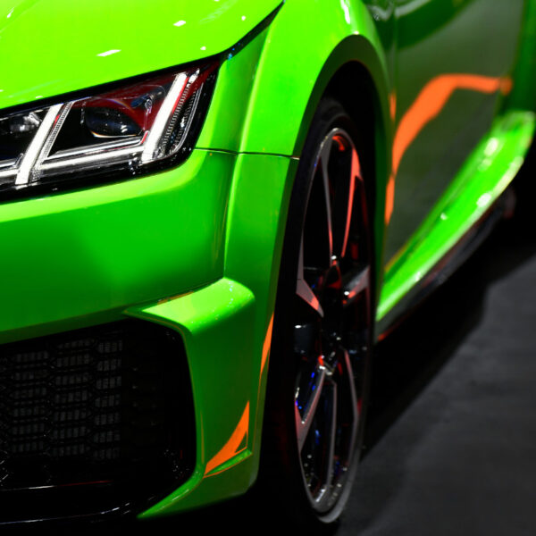 Front,Headlights,Of,Green,Modern,Sport,Car,On,Black,Background, Front,Headlights,Of,Green,Modern,Sport,Car,On,Black,Background,